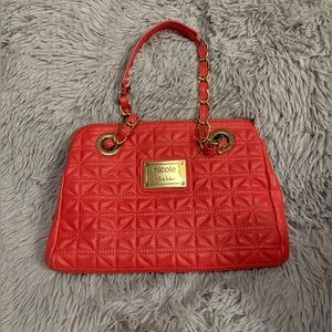 Coral Nicole Miller bag.